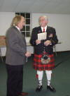 Brother Carlton goes over the schedule with the Reverend Ed Wilkes
