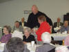 Brother Ronnie delivers a door prize