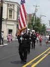 The Commander carries the Flag